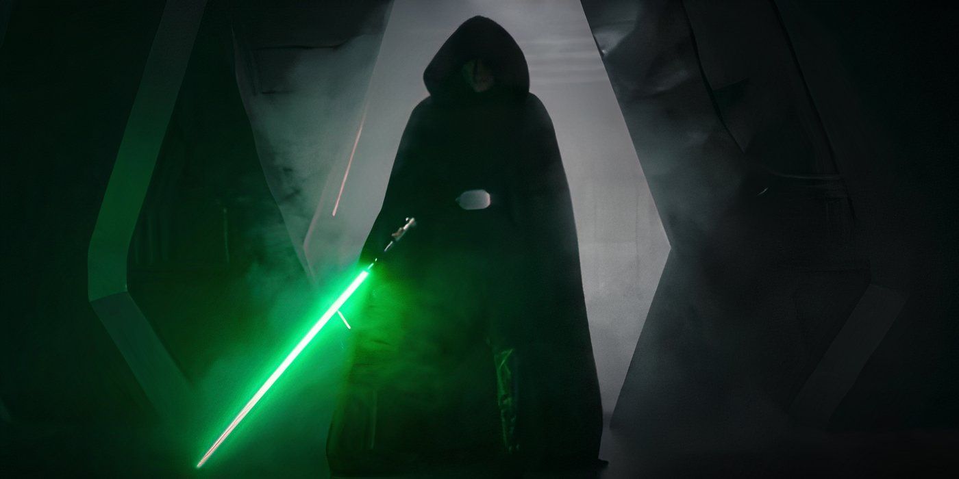 A cloaked Luke Skywalker with his green lightsaber in The Mandalorian