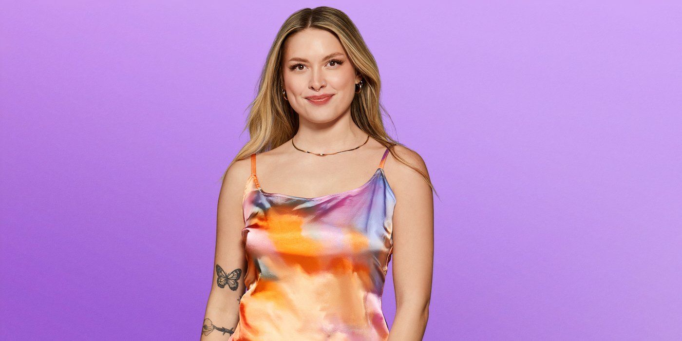 Love Is Blind season 8 Madison Errichiello in a colorful strapless sundress showing her butterfly tattoo on her right arm.