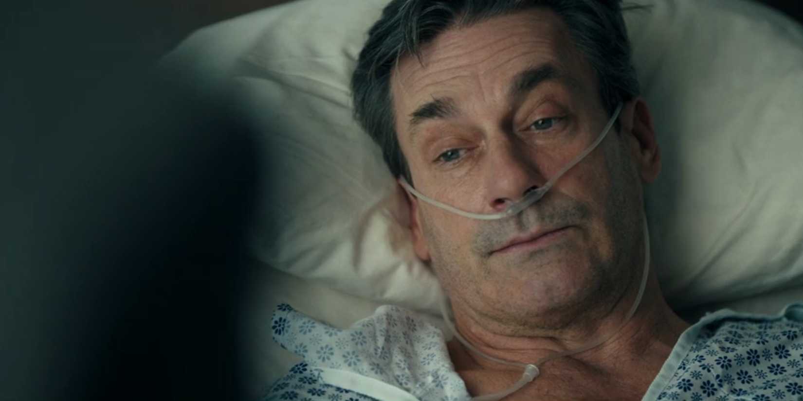 Monty (Jon Hamm) looking weary with a breathing tube in his nose in a hospital bed in Landman season 1, episode 9