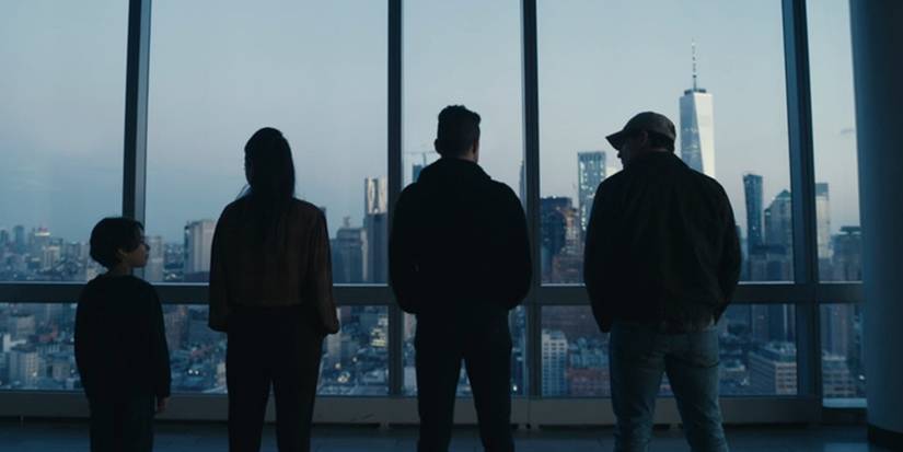Four characters staring at a city skyline in the mr robot finale