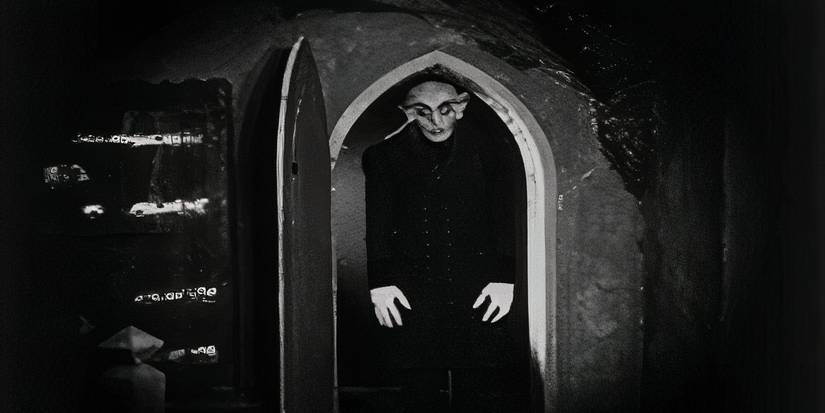 Count Orlok (Max Schreck) standing in a doorway in Nosferatu 1922