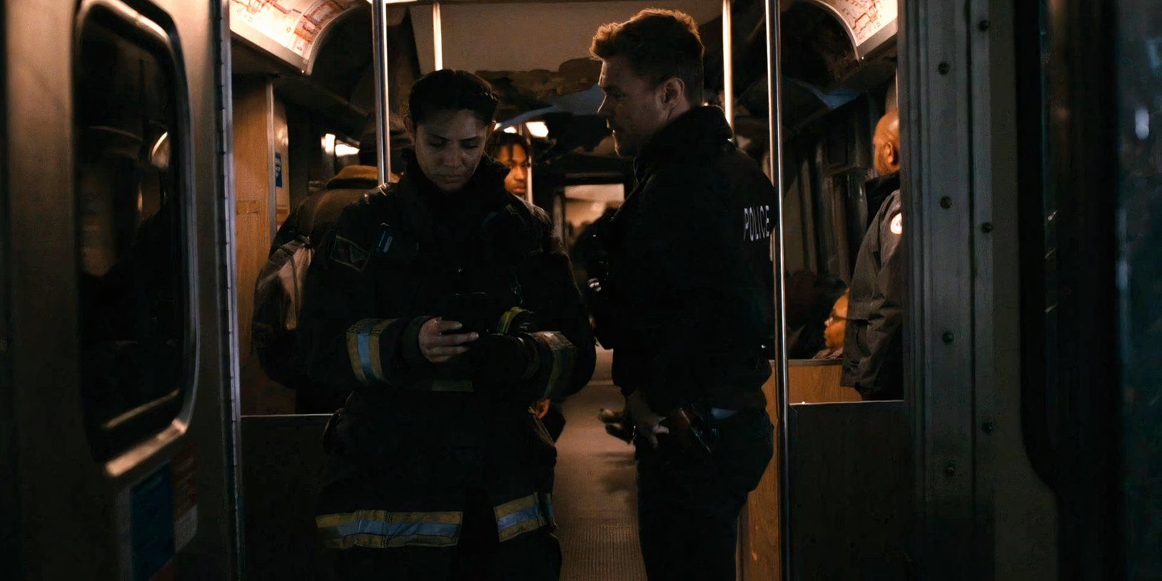 Patrick John Flueger as Ruzek and Miranda Rae Mayo as Kidd in the 2025 One Chicago crossover (1)