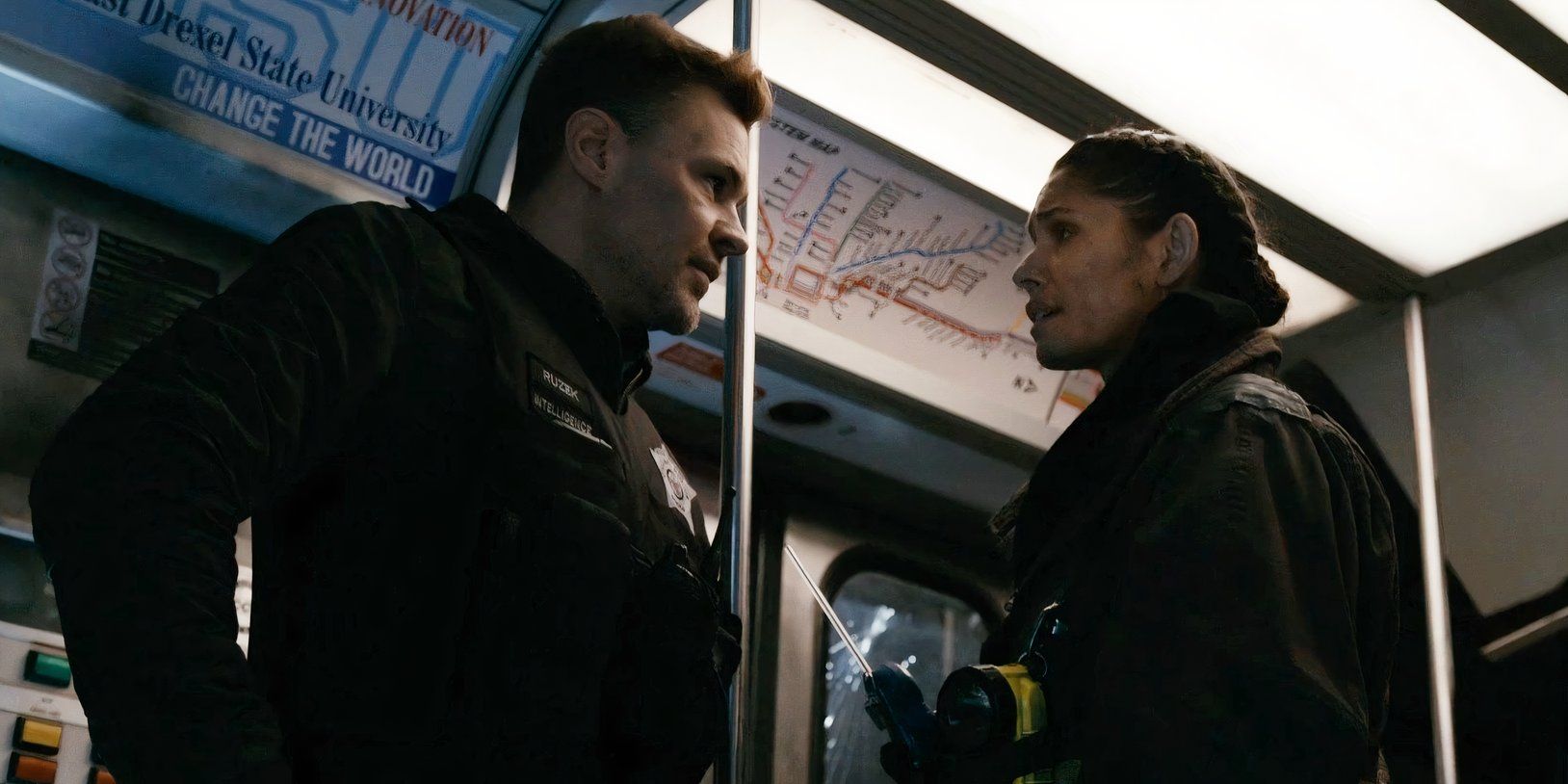 Patrick John Flueger as Ruzek and Miranda Rae Mayo as Kidd in the 2025 One Chicago crossover