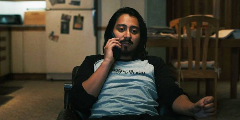 Jason on a phone call while sitting in Scream 6