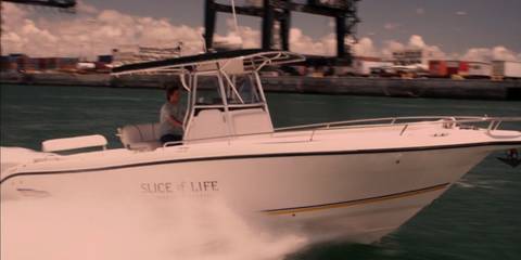 Dexter Morgan (Michael C. Hall) driving the Slice of Life boat in Dexter