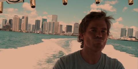 Dexter Morgan (Michael C. Hall) piloting the Slice of Life, his boat, in Dexter season 5, episode 1