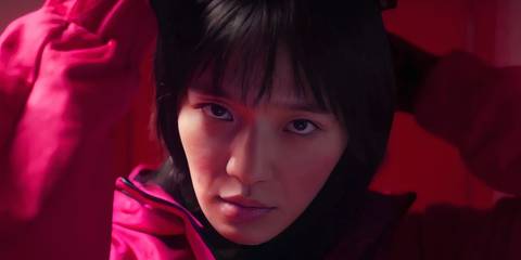 An edited image of No-eul putting her mask on in Squid Game season 2.