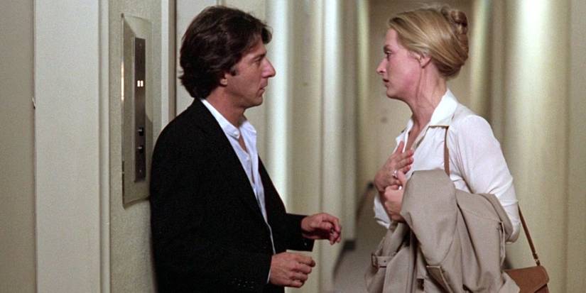 Ted (Dustin Hoffman) and Joanna (Meryl Streep) talking in a hallway in Kramer vs. Kramer.
