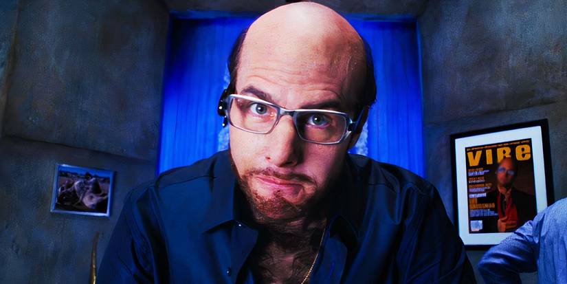 Tom Cruise staring into the camera as Les Grossman in Tropic Thunder