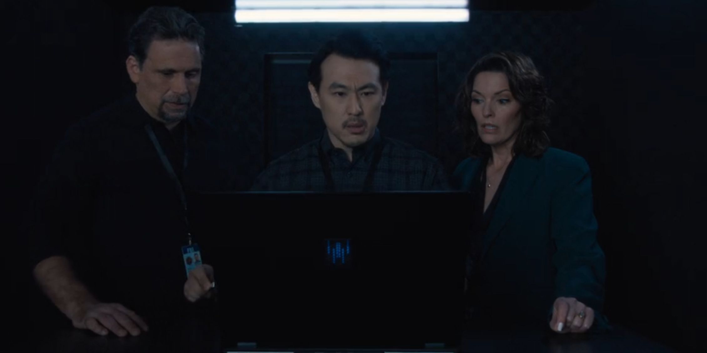 FBI Jubal, Isobel, and Ian stare at a computer