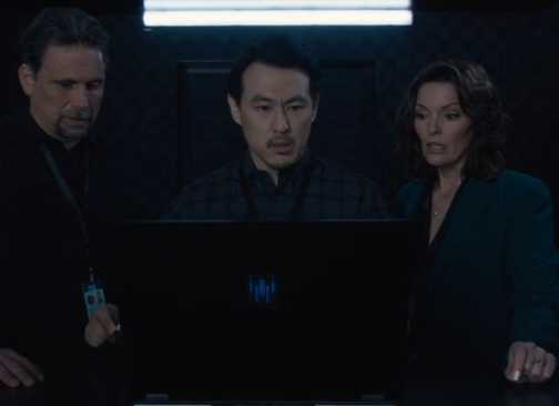 FBI Jubal, Isobel, and Ian stare at a computer