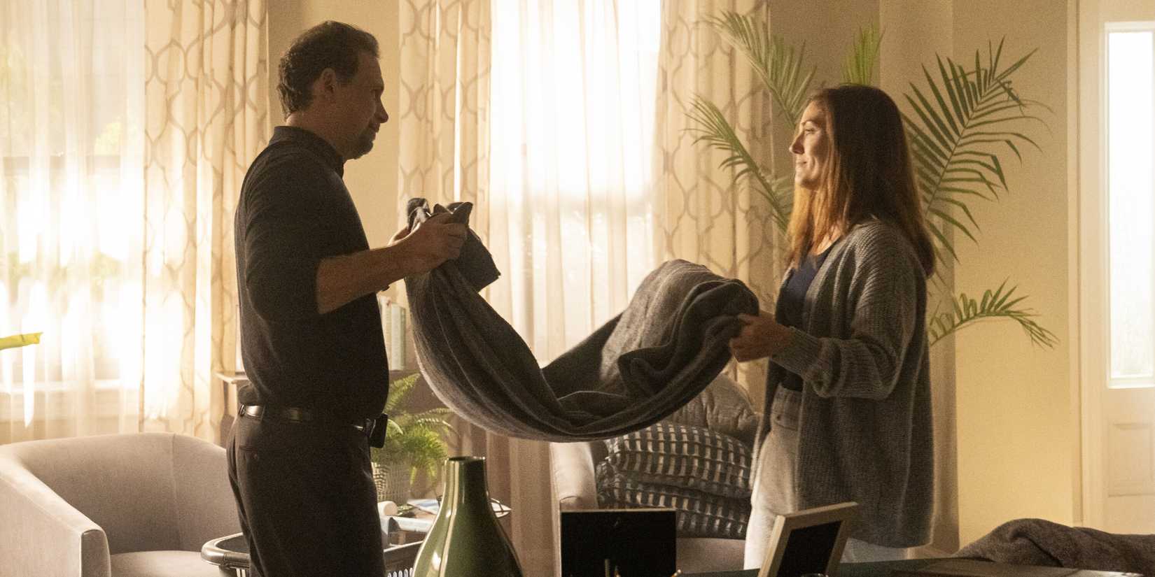 Jubal and Sam folding a blanket in FBI season 7, episode 10