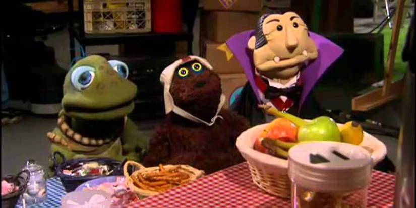 Three characters resembling The Muppets and Sesame Street in Greg The Bunny