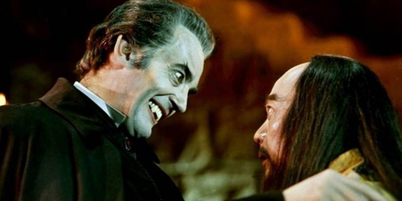 a vampire smiling in The Legend of the 7 Golden Vampires