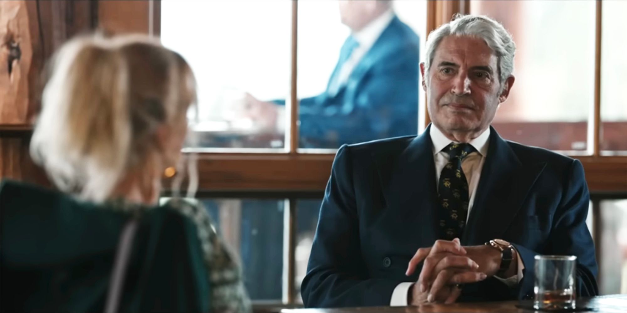 Bob looks on at Beth in Yellowstone