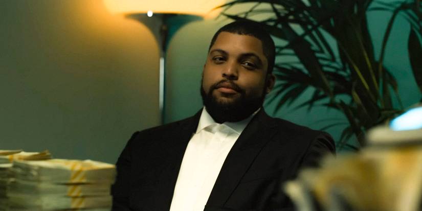 Jean-Jacques (O'Shea Jackson Jr.) looking pleased at the great loot in Den of Thieves 2: Pantera
