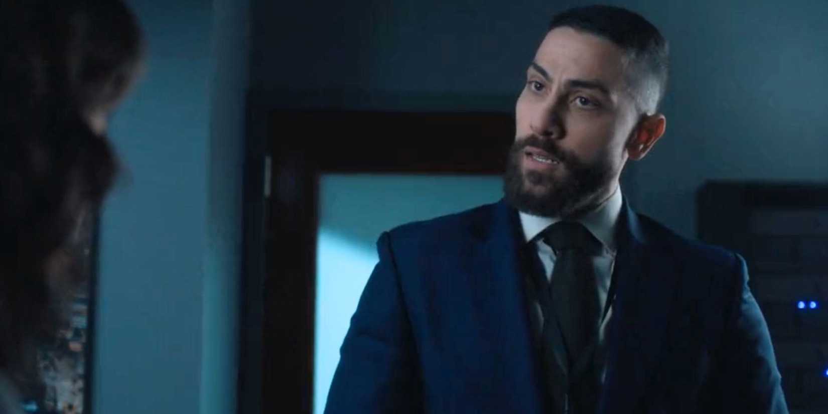 FBI OA standing and listening to Isobel 