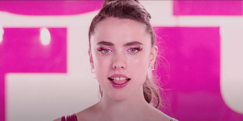 Sue looks at the camera with her mouth open in The Substance