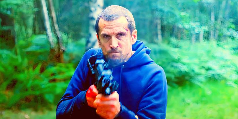 Guillaume Canet firing a gun in Ad Vitam