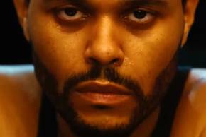 Hurry Up Tomorrow The Weeknd staring into camera