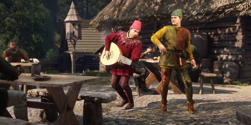 Kingdom Come: Deliverance 2 two minstrel characters performing in front of a crowd