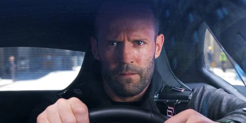 Jason Statham as Deckard Shaw driving a car in Furious 7