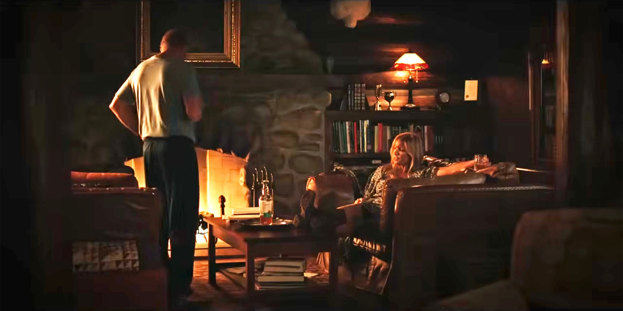 John and Beth talking by the fire in Yellowstone