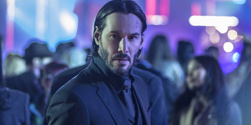 Keanu Reeves as John Wick at the party in John Wick: Chapter 2