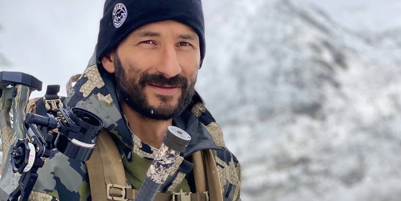 Jordan Jonas looking at camera with winter gear on Alone season 6