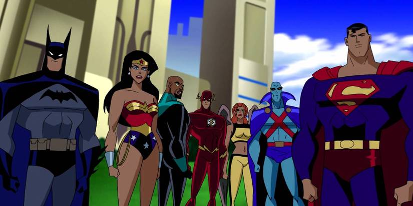 O elenco principal de Liga da Justiça Sem Limites em frente a um prédio