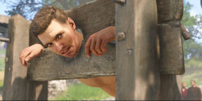 Kingdom Come Deliverance 2 Henry In Stockade Looking to right.