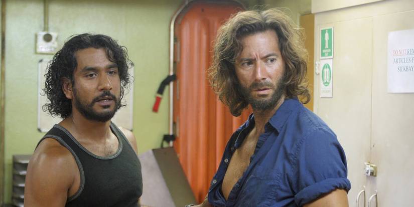 Sayid e Desmond olhando para George Minkowski enquanto presos na enfermaria no episódio de Lost 