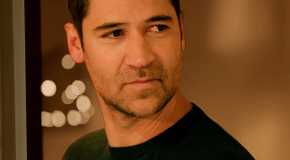 Manuel Garcia-Rulfo as Mickey Haller looking suspicious in The Lincoln Lawyer season 3