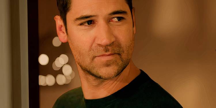 Manuel Garcia-Rulfo as Mickey Haller looking suspicious in The Lincoln Lawyer season 3