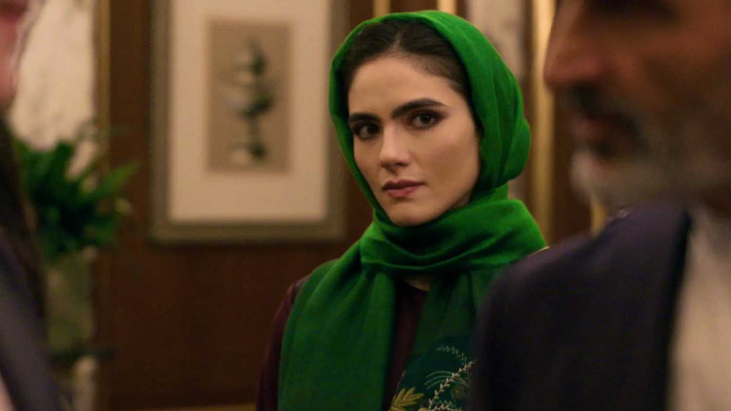 Noor (Arienne Mandi) looking right into the camera in The Night Agent season 2