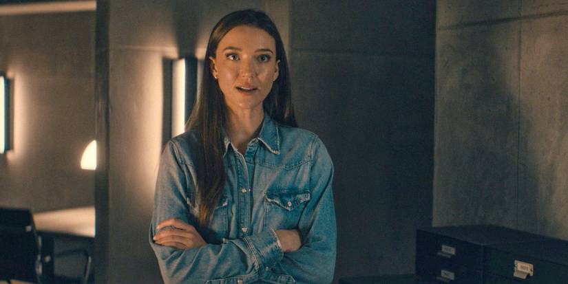 Jane (Nicole Brydon Bloom) folding her arms and looking forward in Paradise (2025)