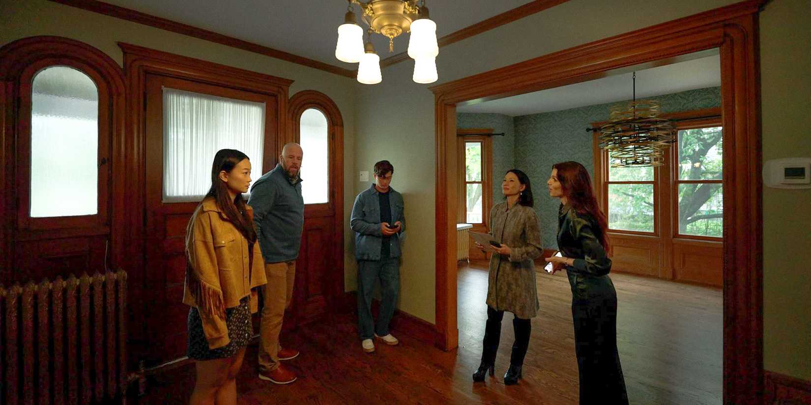 Rebekah and her family visiting a house they want to buy in Presence