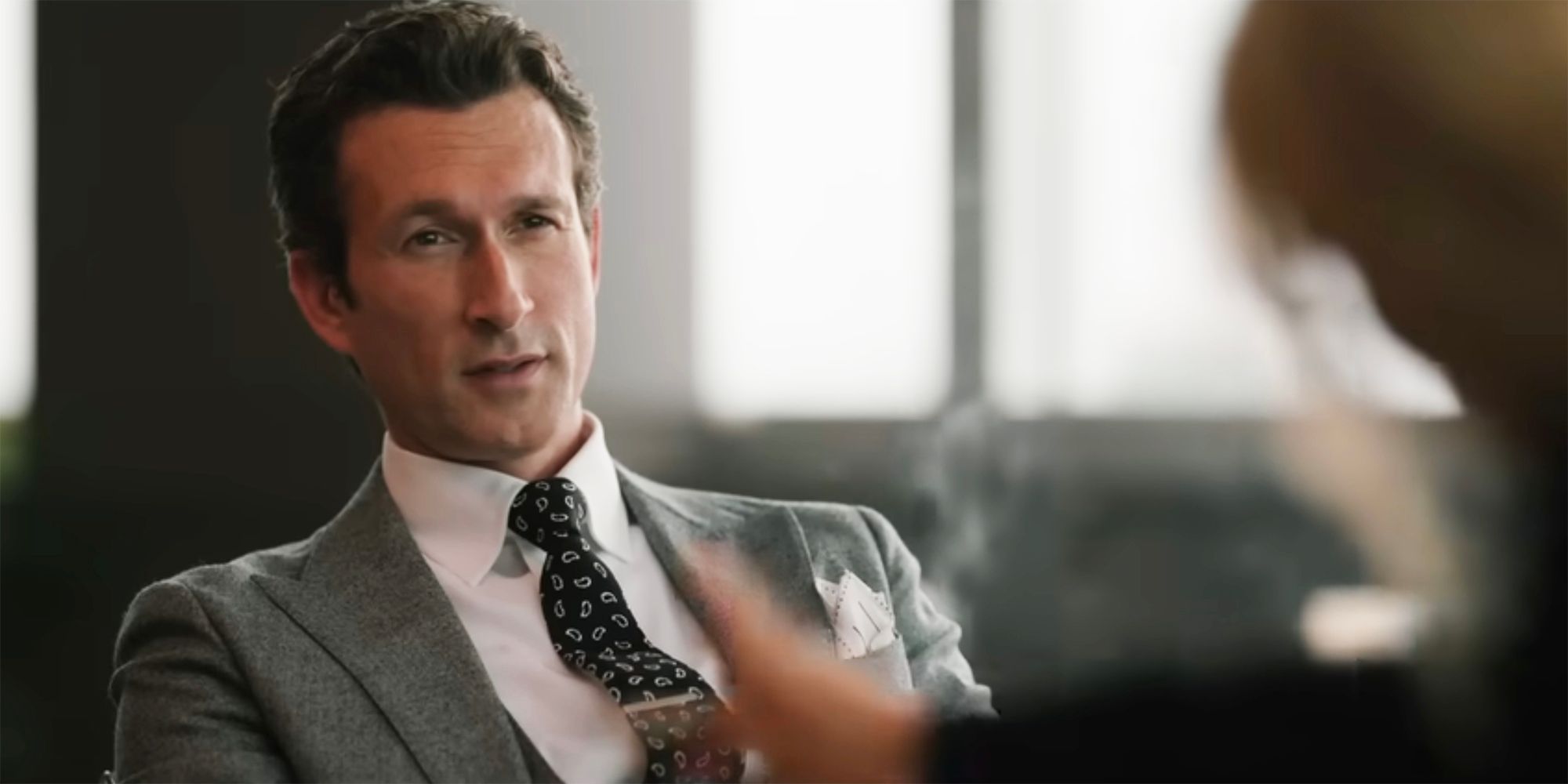 Rob looks on at Beth in Yellowstone