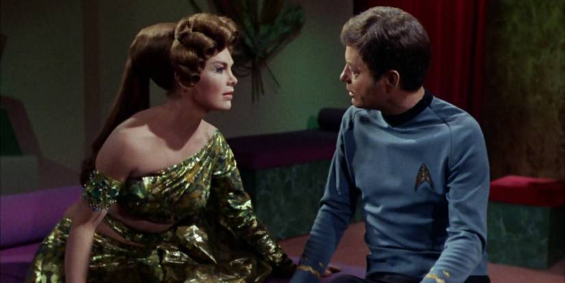 McCoy sits with Natira in Star Trek