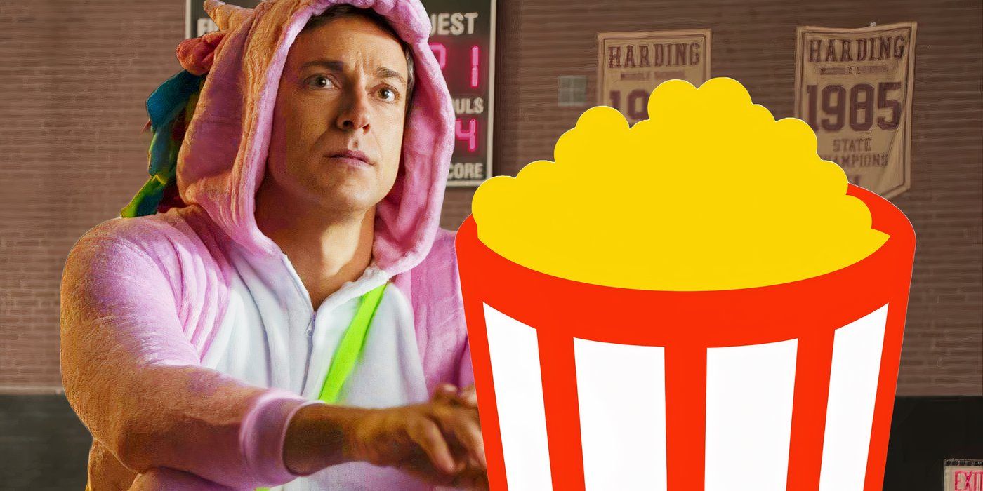 Zachary Levi in a dinosaur costume from The Unbreakable Boy with a Rotten Tomatoes popcorn bucket