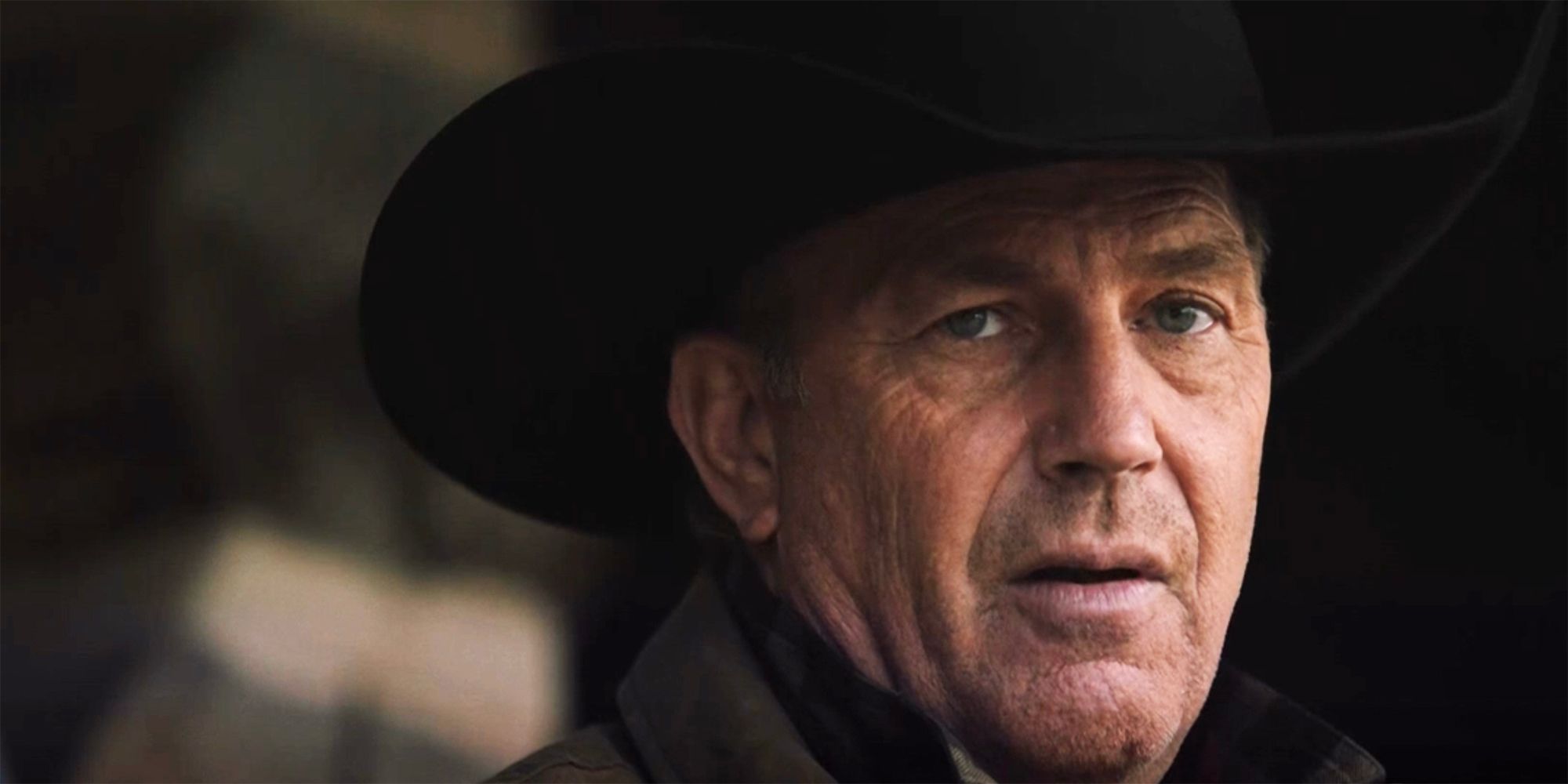 A close up of John Dutton wearing a cowboy hat in the Yellowstone series premiere