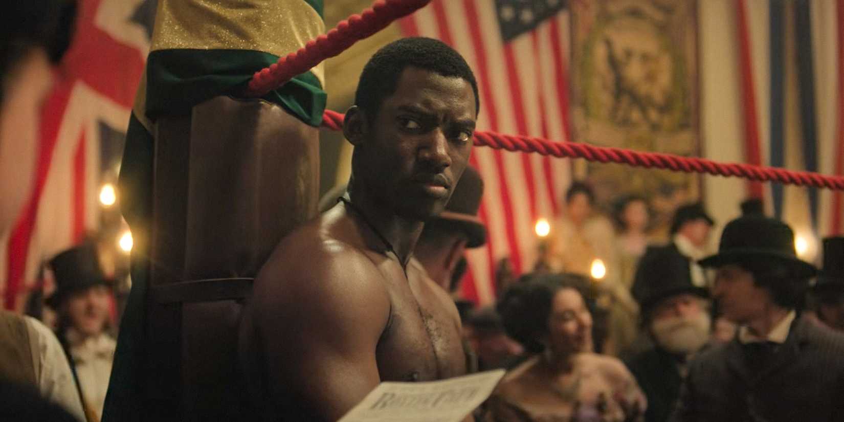 Hezekiah Moscow (Malachi Kirby) confuso ao receber uma carta em A Thousand Blows Temporada 1 Episódio 6