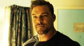 Alan Ritchson as Jack Reacher, looking to Neagley, in season 3