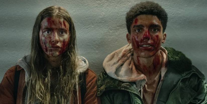 Annalise (Nadia Parkes) and Nathan (Jay Lycurgo) covered in blood in Half Bad- The Bastard Son & The Devil Himself.