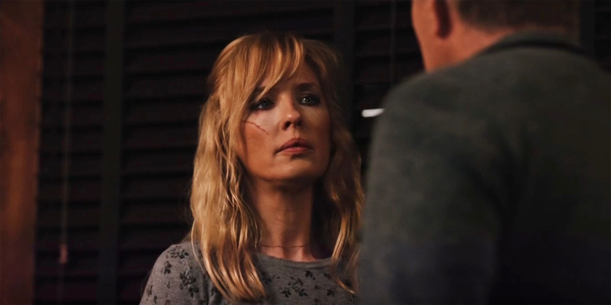 Beth looking severly at John in Yellowstone