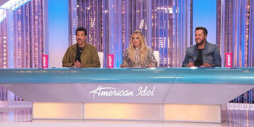 Who Received American Idol Season 24 Platinum Tickets & How Are They Different This Year? (SPOILERS) 1 Carrie Underwood, Lionel Richie and Luke Bryan behind judging table on American Idol