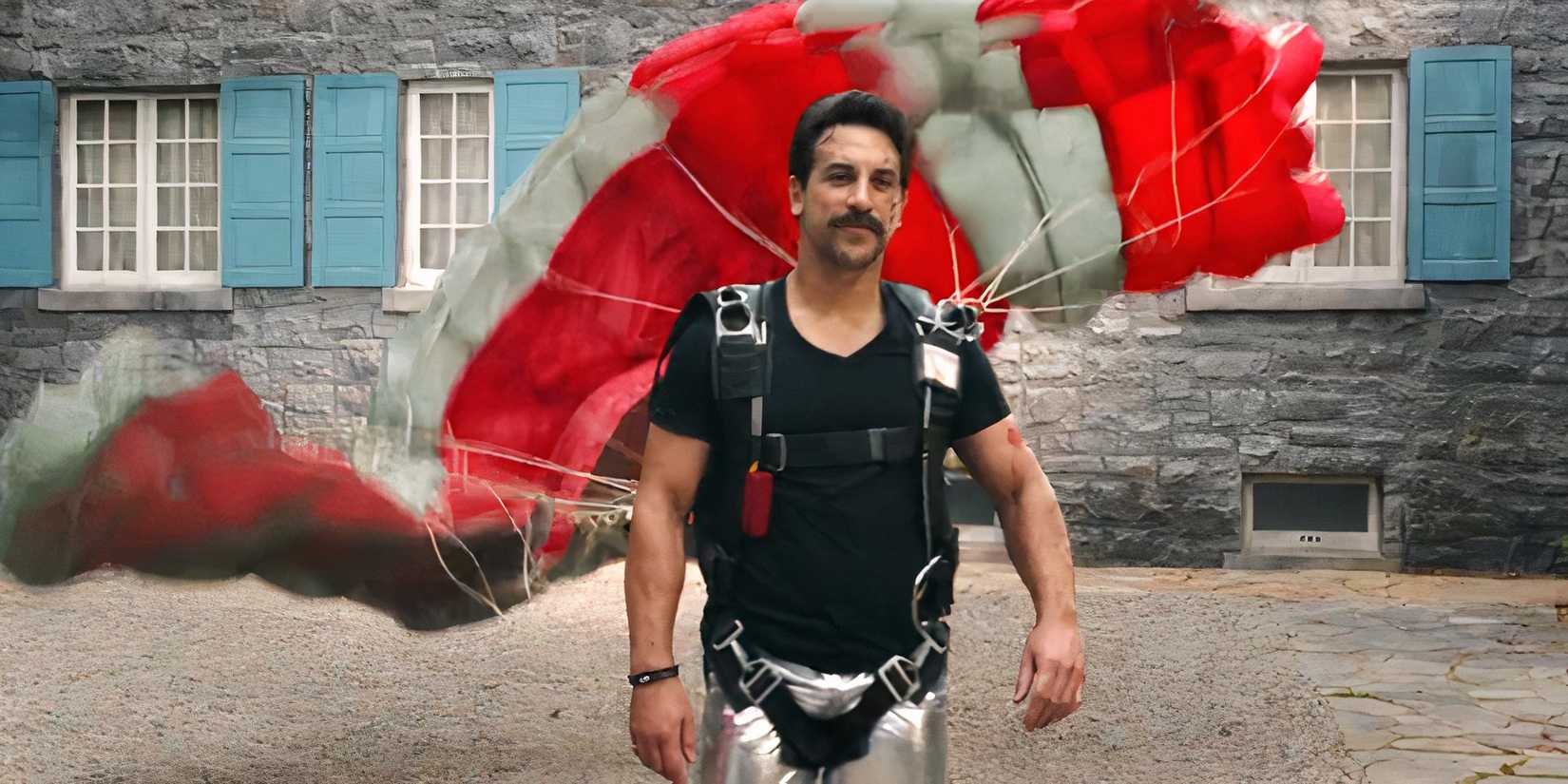 Chris with parachute behind him in Ghosts season 4 episode 16