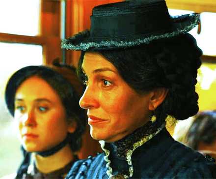 Claire and Mary Abel on the train in 1883, with a splash of color