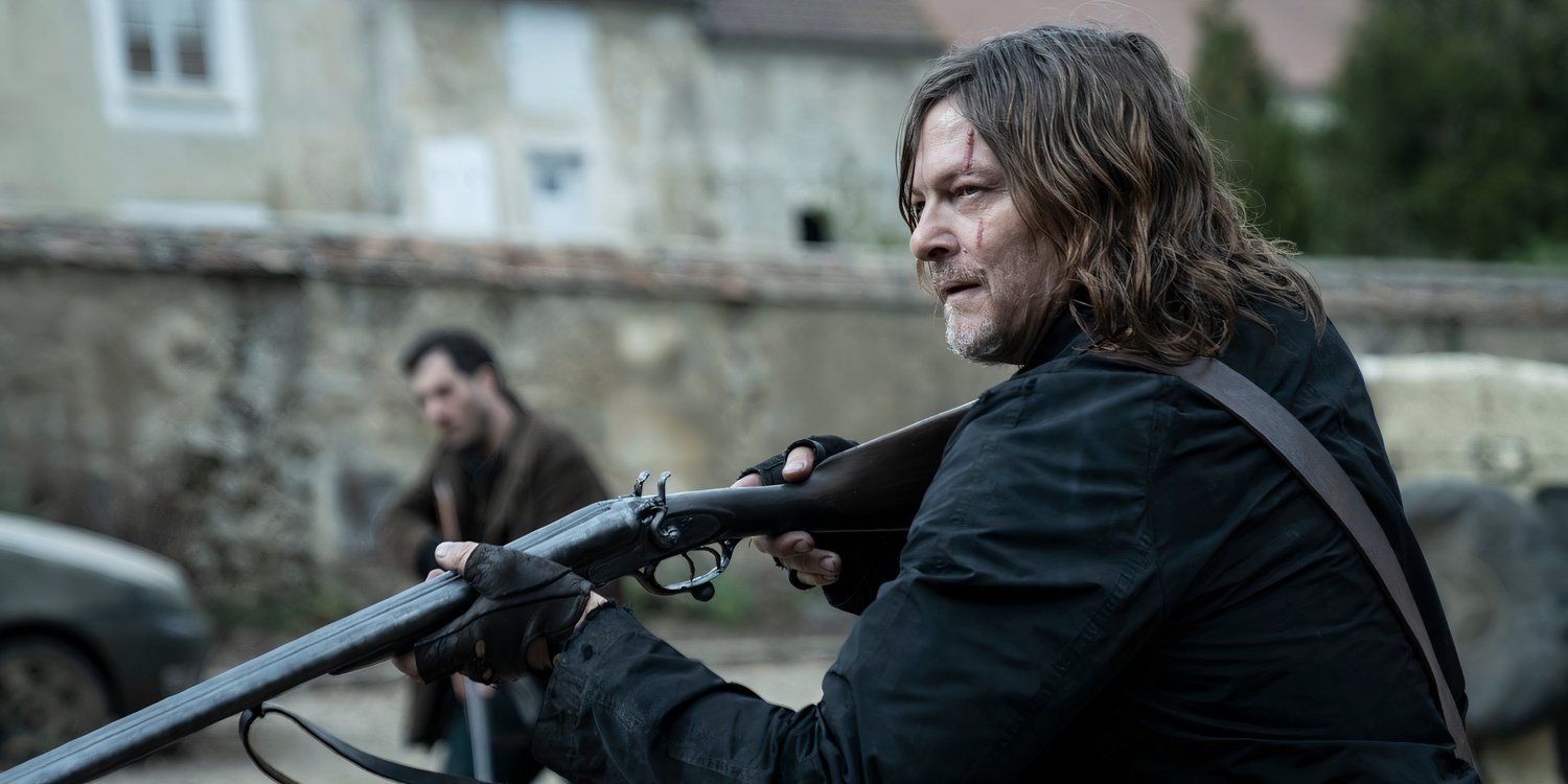 Daryl holding a shotgun in The Walking Dead Daryl Dixon