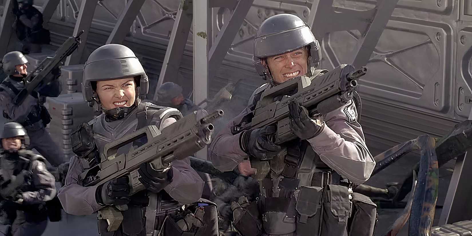 Dizzy and Rico aiming their guns in combat in Starship Troopers